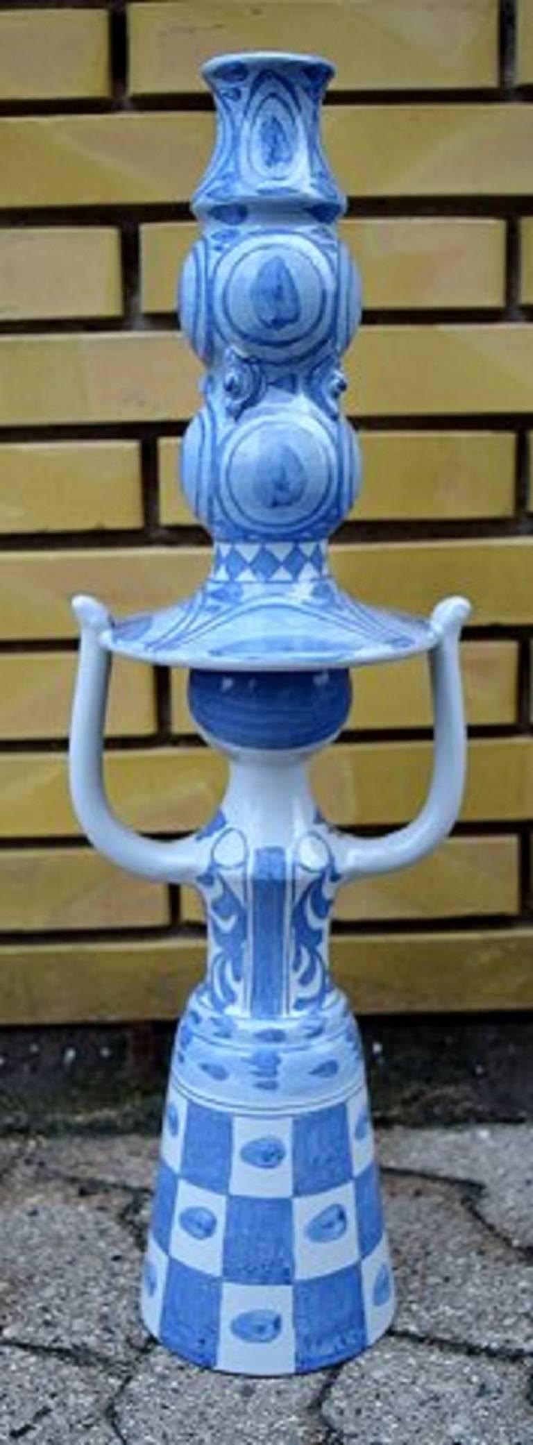 Colossal Bjorn Wiinblad figure. Candlestick L15.

The Blue House, Denmark.

Measures: 67 cm. x 21 cm.

Monogram, 1974.

In perfect condition.