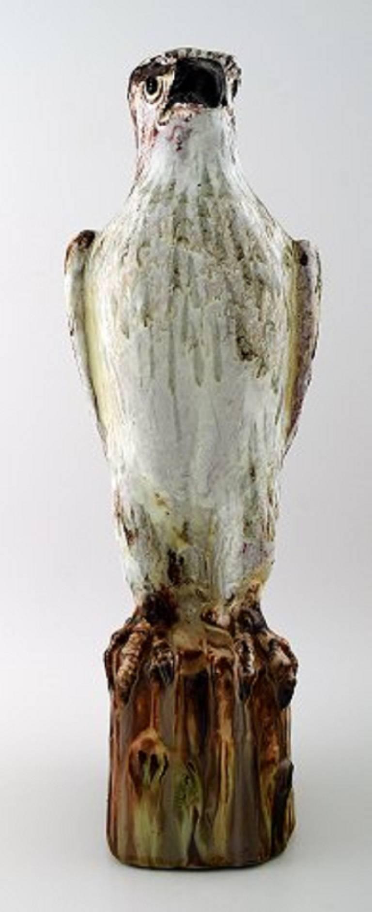 Gudmundur Mar Einarsson b. Middal 1895 d. 1963:

Icelandic falcon of art pottery decorated with gray, green, brown and white glaze.

Signed in monogram GE, Iceland, 1940 ?.

Measures: 42 cm x 12.5 cm.

In perfect condition.