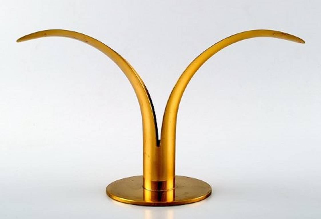 Two pairs of candlesticks in brass, "Liljan" Ivar Alenius Bjork, Ystad metal.

Measures: 13 cm. height and 22 cm. in diameter. 

Swedish design Classic. 

Mid-20th century.

Good condition, light wear.