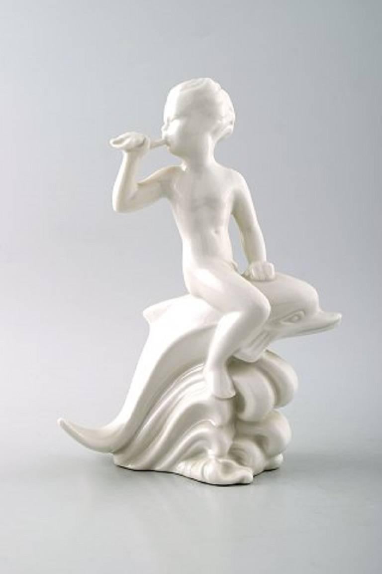 Two Harald Salomon for Rörstrand, blanc de chine or white glazed figurines depicting faun or pan figures riding on dolphins and fabulous animals,

Sweden, mid-20 century.

Marked. In perfect condition. factory 1st.

Measures: 16 x 17 cm.