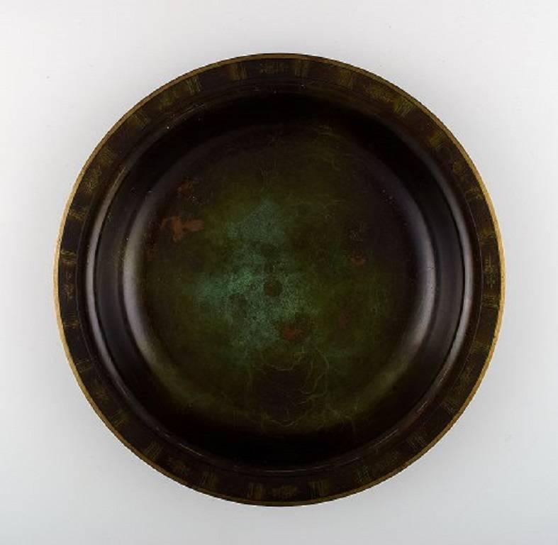 Just Andersen bronze large bowl.

1930s-1940s.

Signed LB 1695.

In very good condition, beautiful patina.

Measures: 30 cm. x 4 cm.