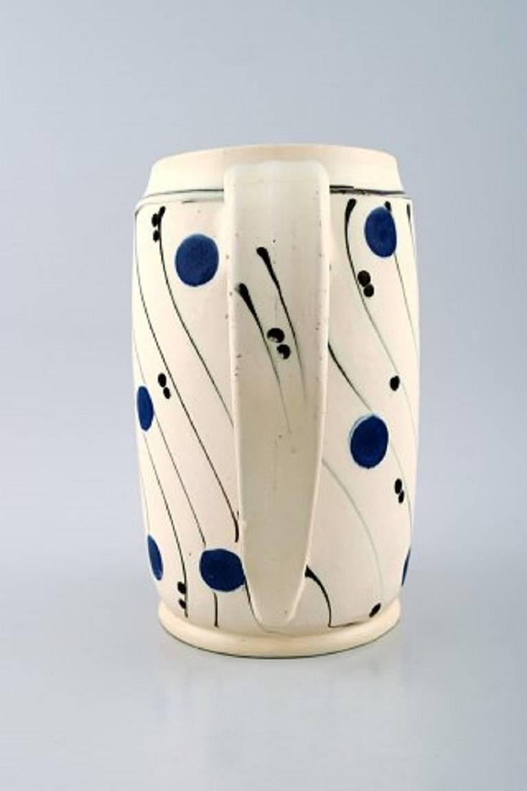 Kähler, Denmark, glazed stoneware mug. Large mug with handle.

Marked. 1930s.

Measures: 20 cm.

In perfect condition.