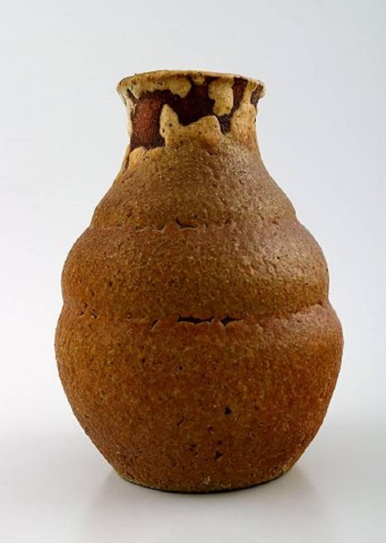 Early unique Patrick Nordstrom, own workshop, pottery vase.

Beautiful glaze in earthy colors.

Signed. 1910s.

Measures: 15 x 9 cm.

In perfect condition.