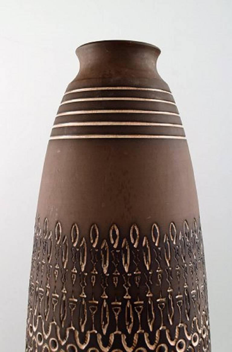 Ulla Winblad for Alingsas Ceramics, Sweden, floor vase in modern design.

Measures: 52 cm. x 16 cm.

In perfect condition.