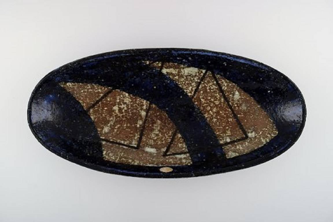 Grand plat en céramique Ingrid Atterberg pour Upsala Ekeby.

En parfait état.

Dimensions : 41 x 7,5 cm : 41 x 7,5 cm.

Marqué.