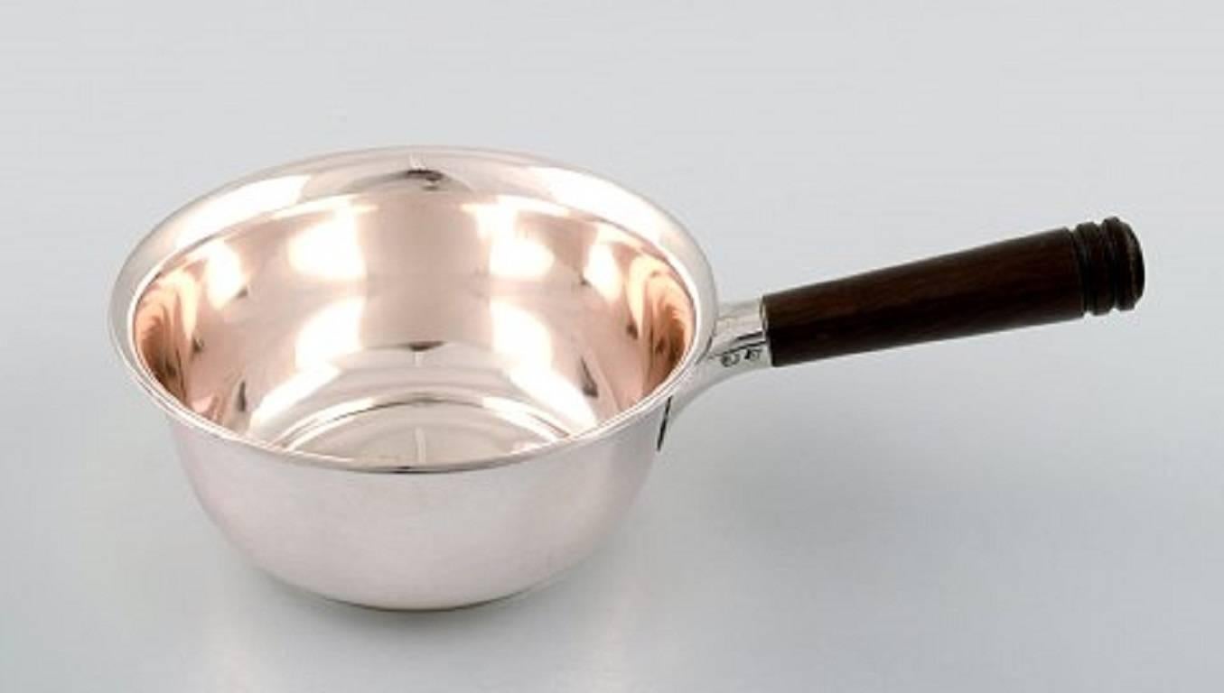 Jens Sigsgaard, silver saucepan, handle in fruit tree.

Denmark, 1930s-1940s.

In perfect condition.

Marked.

Measures: 15 cm.

Weight: 136 g.