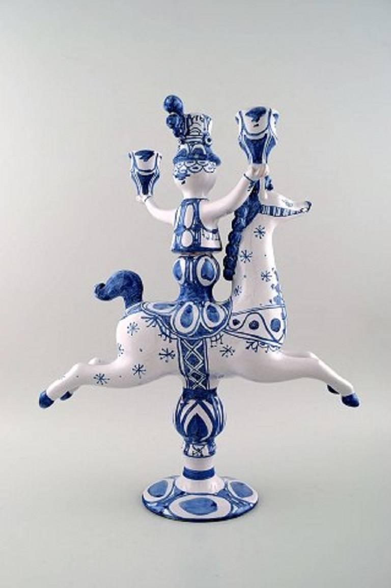 Bjørn Wiinblad large ceramic figure from the blue house.

Figure and candlestick, rider on horseback with space for three lights.

Decoration number L5.

Dated 1983.

Measures: Height 42 cm., length 30 cm.

Perfect condition.