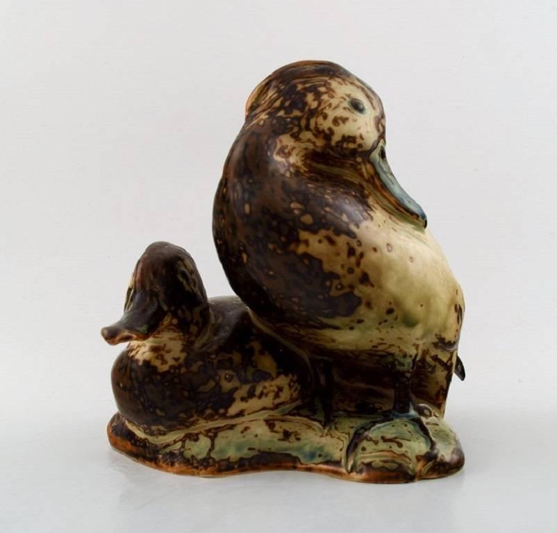 Royal Copenhagen stoneware figure number 20004, tufted ducks.

Knud Kyhn.

In perfect condition.

Measures: 17 x 18 cm.

4th factory quality.