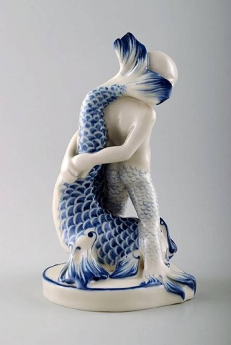 Swedish Rare Rörstrand Porcelain Figure, Sea Boy and Fish For Sale