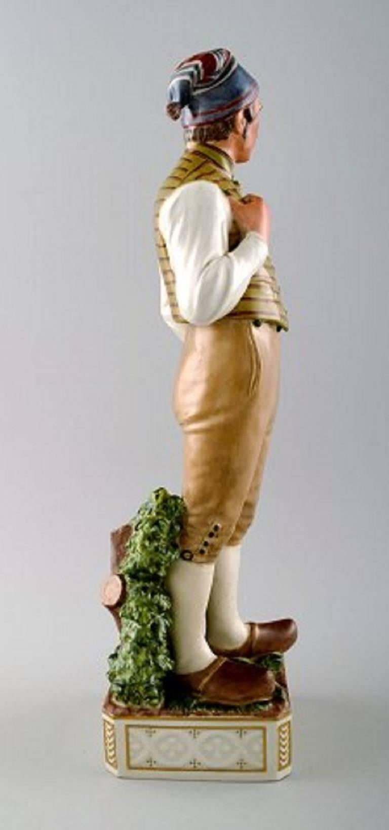 Other Carl Martin-Hansen, Porcelain Figure of Male in National Dress. Royal Copenhagen