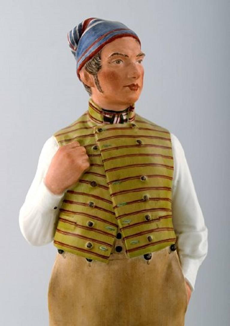 Danish Carl Martin-Hansen, Porcelain Figure of Male in National Dress. Royal Copenhagen