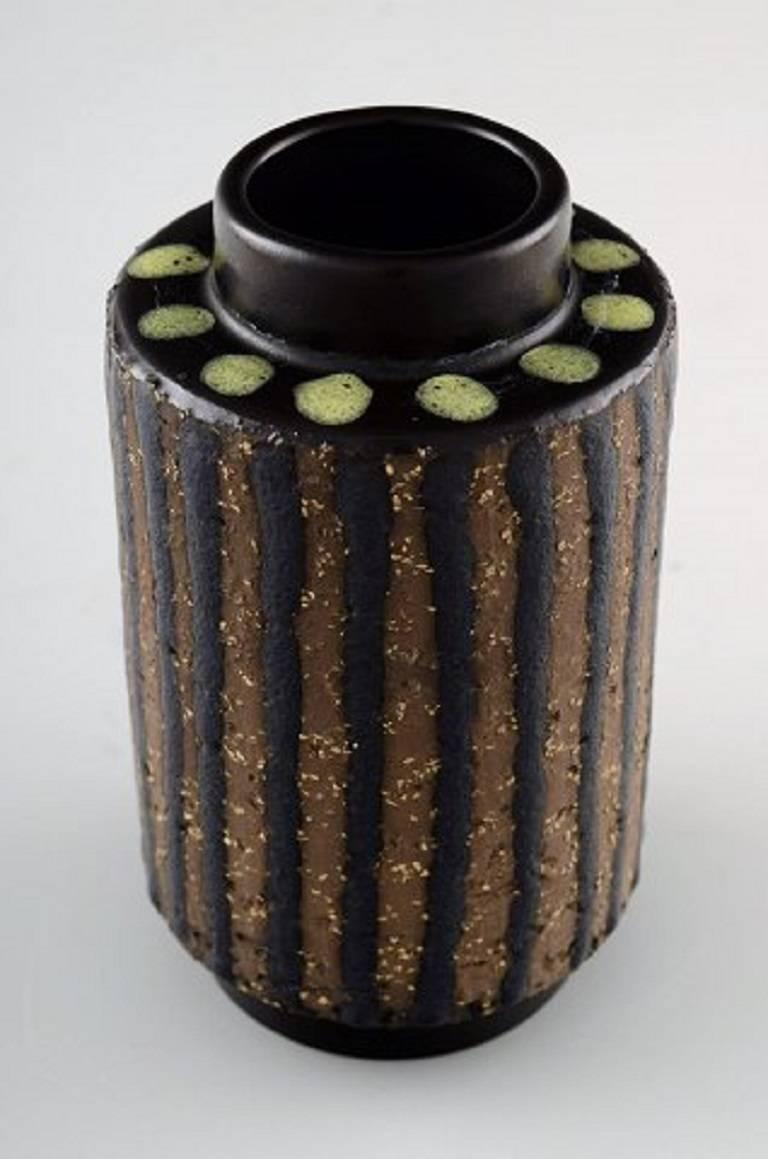 Mari Simmulson for Upsala-Ekeby "Ringo" ceramic vase.

In perfect condition.

1965-1967.

Measures: 14.5 x 9 cm.

Stamped.