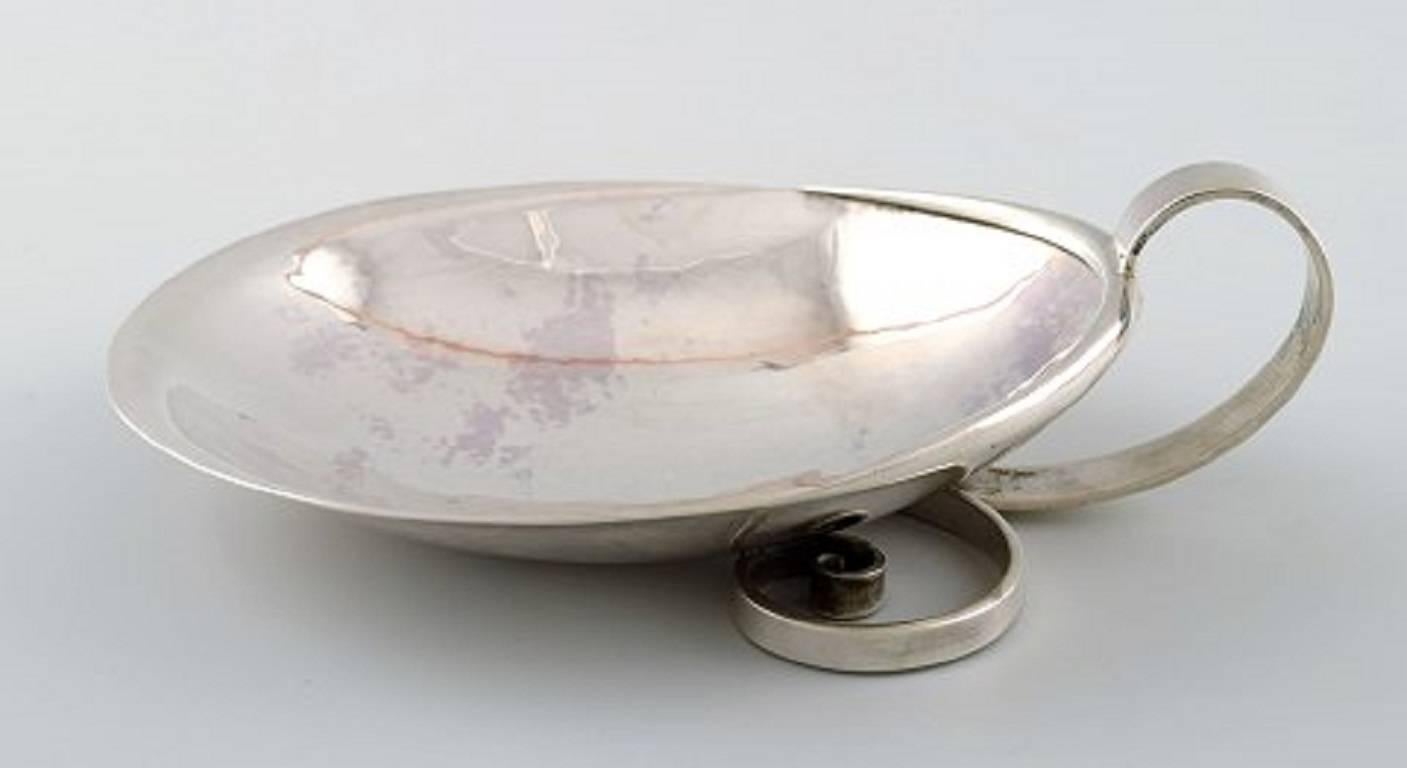 Hans Hansen, Kolding. Bowl of sterling silver.

Made in 1963.

Stamped Hans Hansen 925S, anno 1963.

Measures: 16.5 cm x 11.5 cm.

In perfect condition.