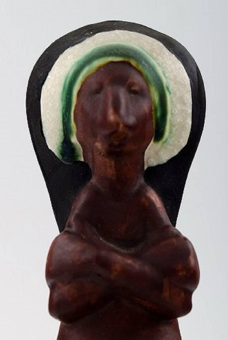 Rolf Palm, Höganäs, Indian, unique ceramics figure. 

Swedish design, 1950s.

Measuring: 21.5 cm.

Stamped.

In perfect condition.