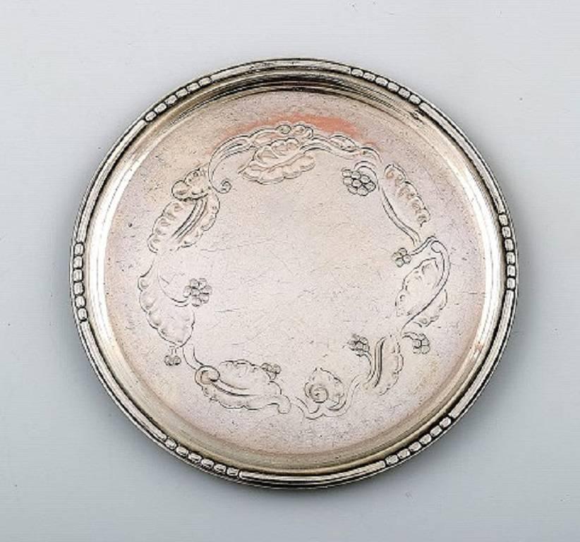 Georg Jensen two coasters in sterling silver # 51C.

Stamped with post-1945 stamps.

Measure: Diameter 7.7 cm/3 