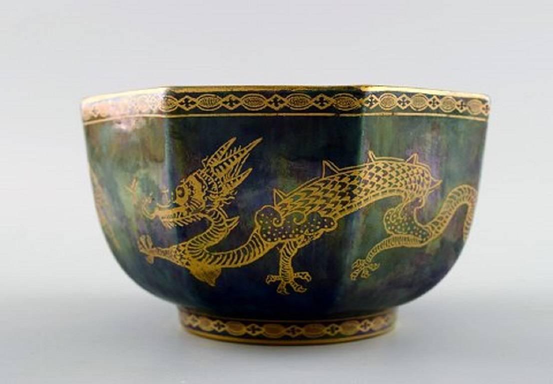 Wedgwood fairy luster bowl in dragon pattern.

Measures: 12 cm. x 7 cm.

In perfect condition.

Stamped.