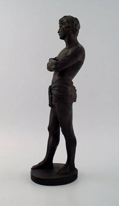 P. Ipsen / L. P. Jorgensen. Figure of Man with Hissing Cloth, Black Terracota