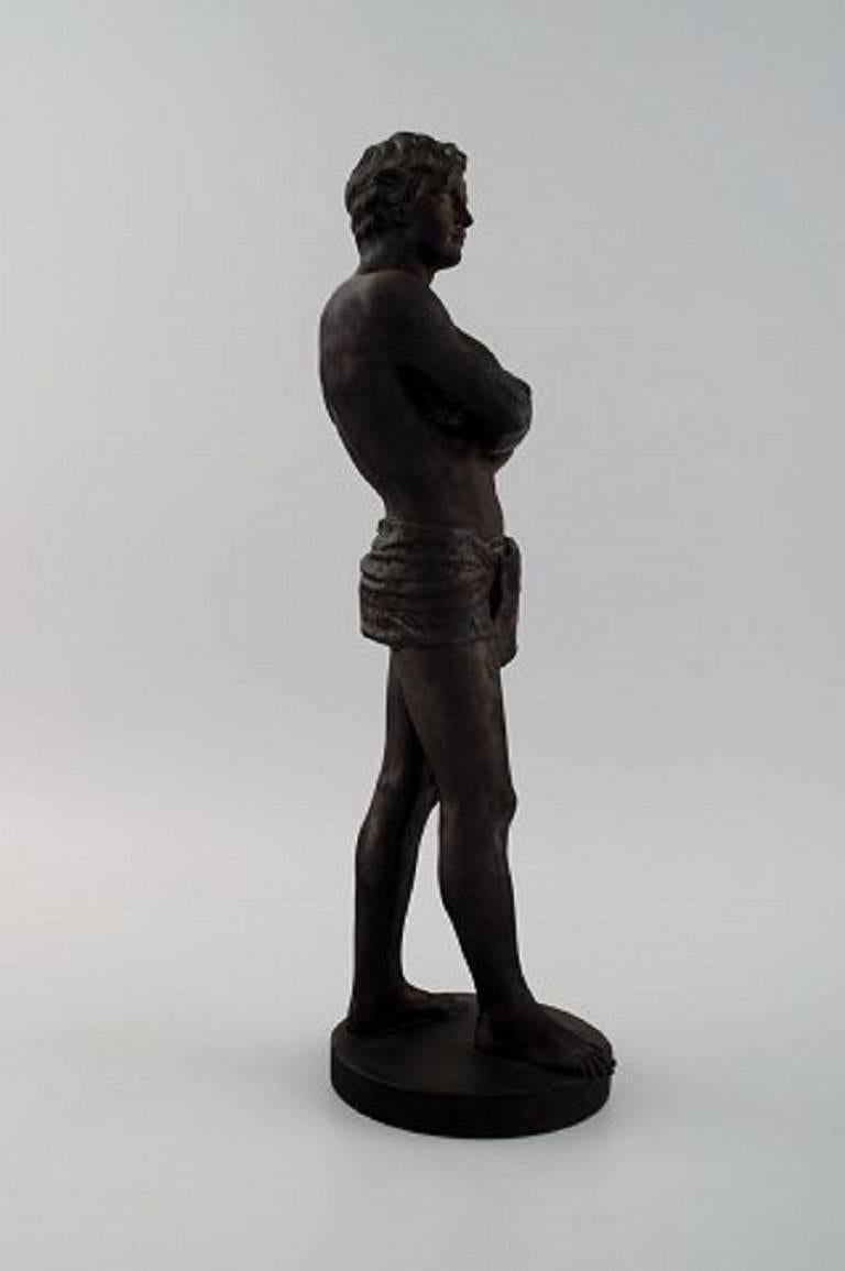 Neoclassical P. Ipsen / L. P. Jorgensen. Figure of Man with Hissing Cloth, Black Terracota