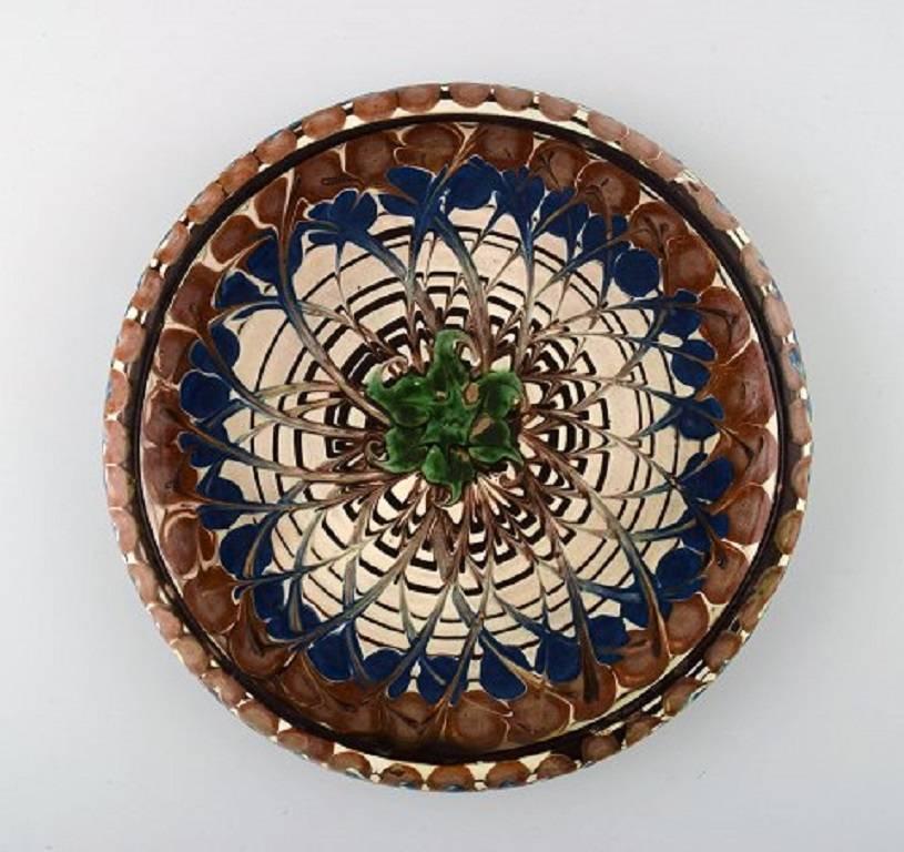 Kähler, Denmark, glazed stoneware dish bowl.

circa 1940s.

Stamped.

Measures: 21.5 cm. X 3.5 cm.

In perfect condition.