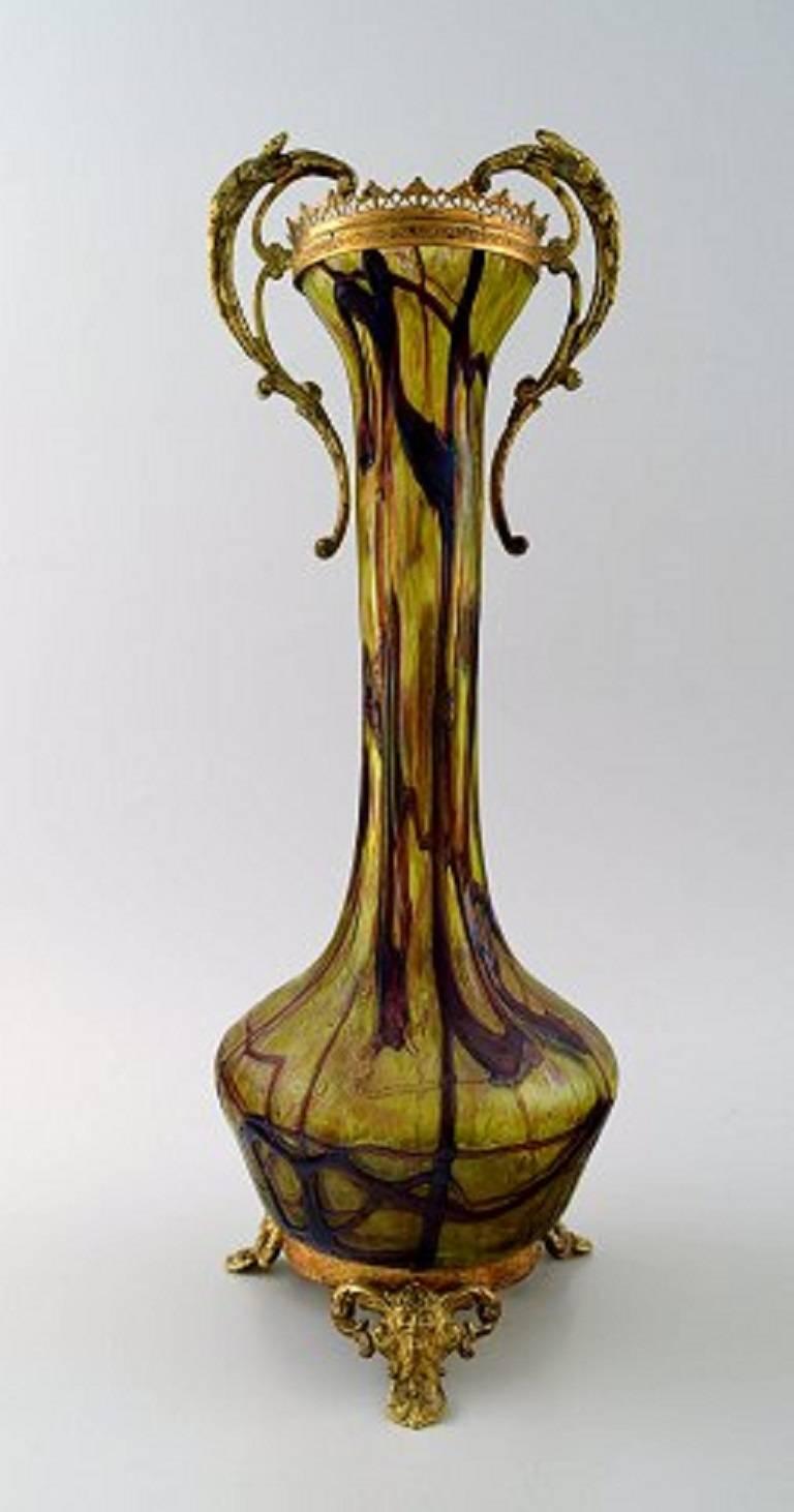 Art Nouveau a pair of large art glass vases, bronze fittings with salamander and faun,

circa 1900.

Measures: 38 x 13 cm.

In very good condition.