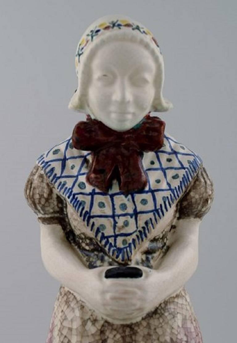 Danish Michael Andersen Ceramics from Bornholm. Large Figure of Woman with Songbook For Sale