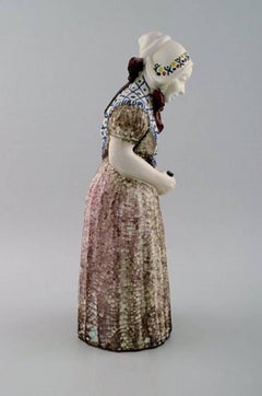 Michael Andersen Ceramics from Bornholm. Large Figure of Woman with Songbook