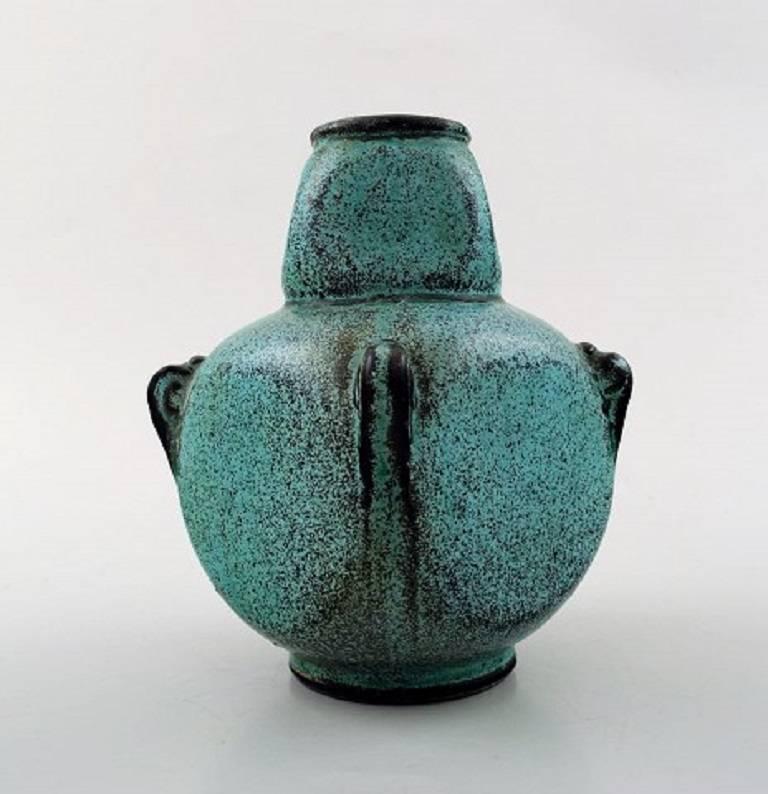 Svend Hammershoi for Kähler, Denmark, glazed stoneware art pottery vase, 1930s.
Designed by Svend Hammershoi.
Turquoise Green double glaze.
Measures 13.5 x 9 cm.
Marked.
In perfect condition.