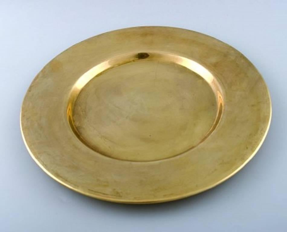 Set of 12 cover plates in brass.
Danish design 1960s.
In perfect condition, beautiful patina.
Measures: 29.2 cm.