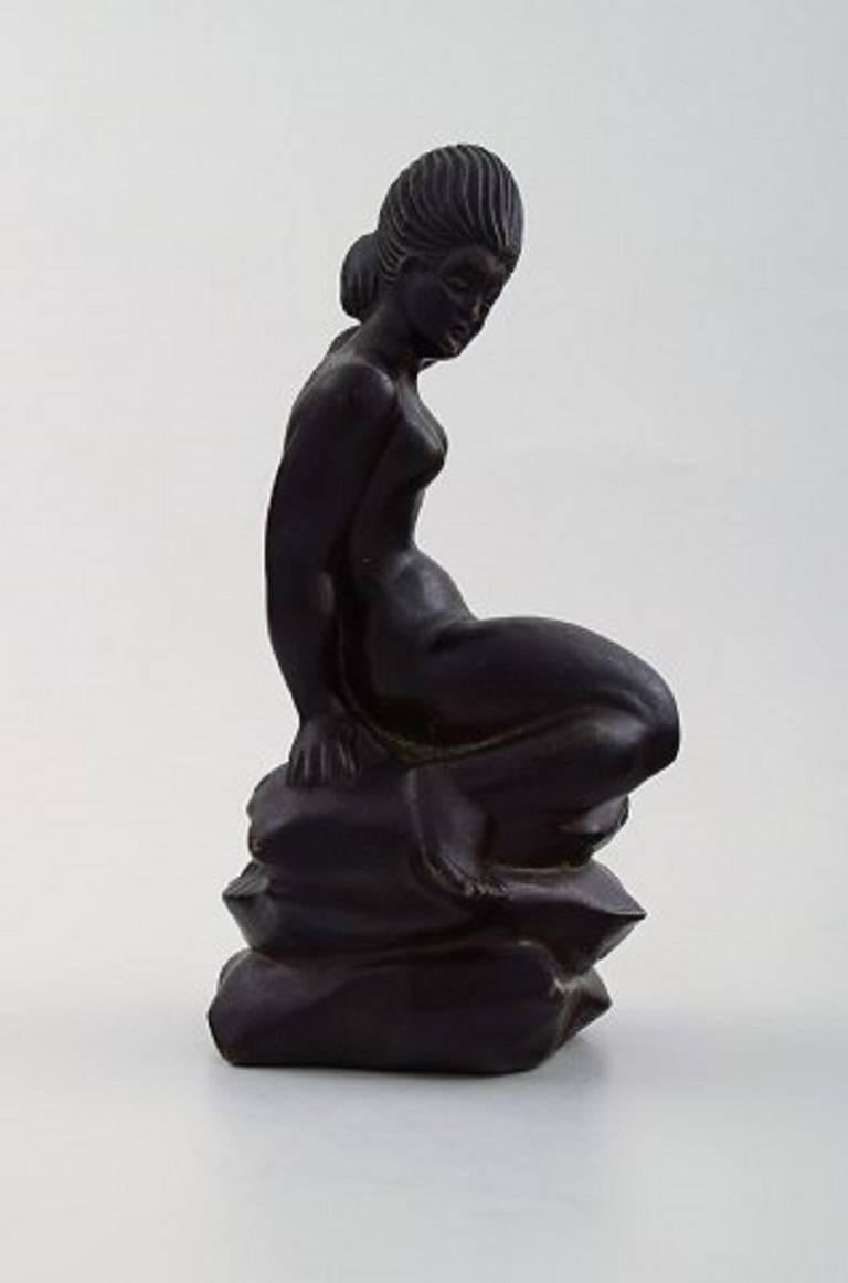 Hans Kongslev for Tinos, Princess on the pea after H. C. Andersen, dark patinated pewter.
Denmark, 1940s.
Stamped Kongslev, Tinos.
Measure: Height 16.5 cm. Diameter 8.5 cm.
In perfect condition, beautiful patina.