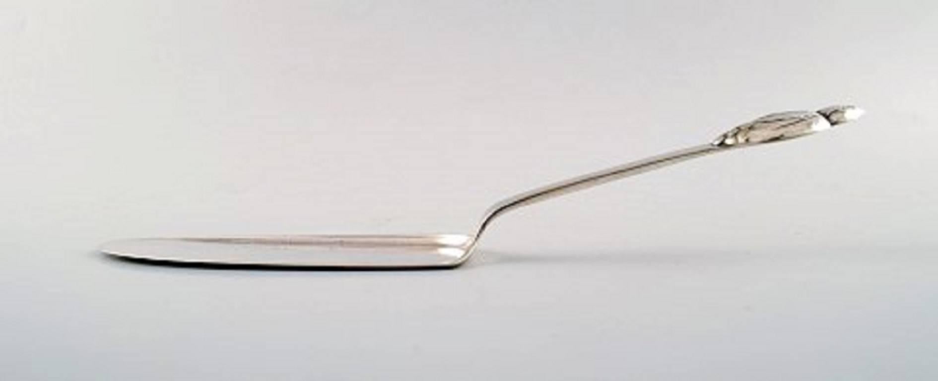 Evald Nielsen number 6, serving spade in silver.
Measures 26.5 cm.
Stamped.
In perfect condition.