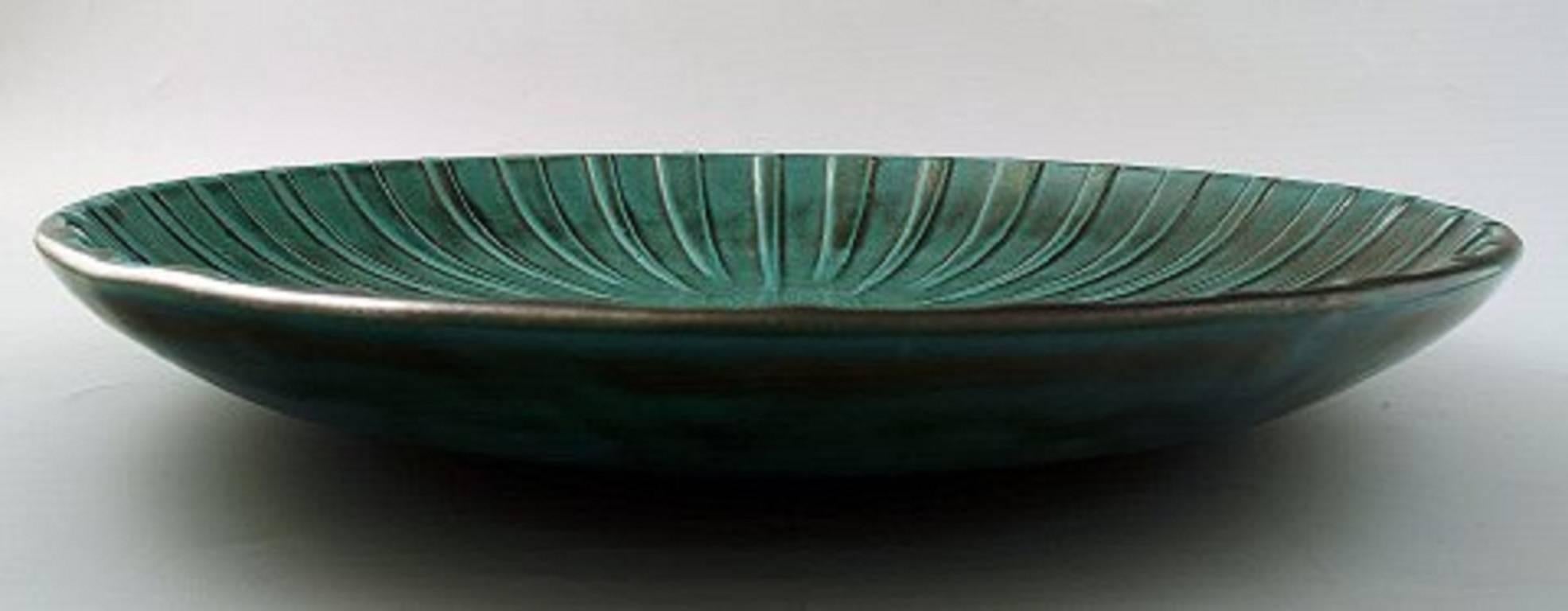 Upsala-Ekeby large ceramic dish in Art Deco style.
Sweden, 1940s-1950s.
In perfect condition.
Measures 37 cm. x 6 cm.
Stamped.