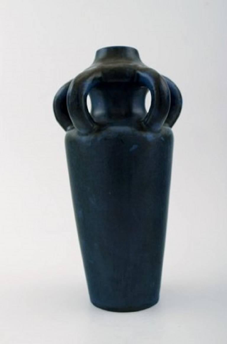 Höganäs ceramic vase.
Beautiful dark blue glaze.
Stamped, approximate Sweden, 1920s.
23 cm. x 11 cm.
In perfect condition.
