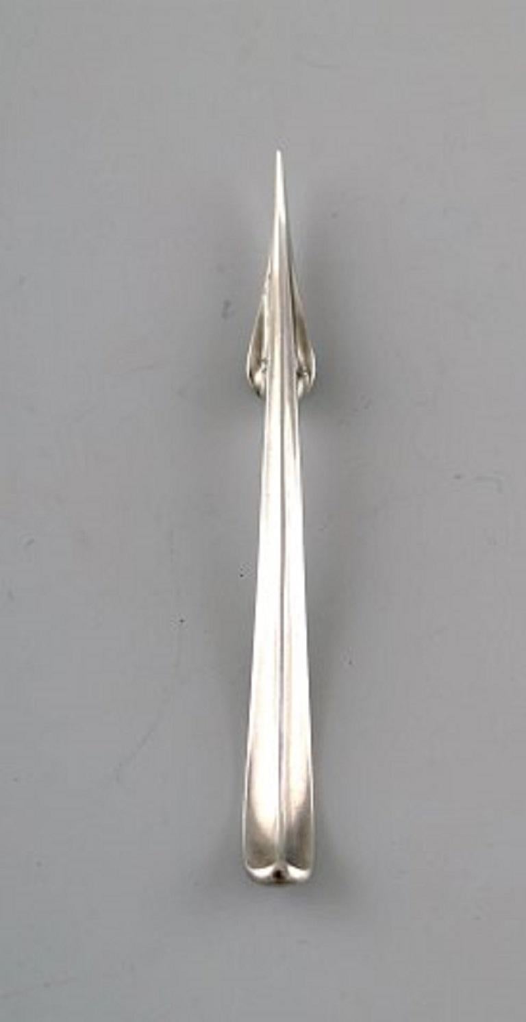 Georg Jensen nut picks / cocktail picks of Sterling Silver, 'Blossom', 1933-1944.
In perfect condition.
Stamped.
Measures: 7.5 cm.