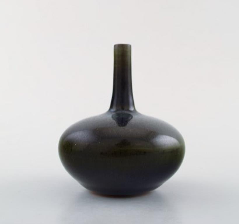 Rolf Palm, Mölle, unique ceramic vase in dark shiny glaze. Swedish design, 1971.
Measures: 7 x 7 cm.
Stamped and dated.
In perfect condition.