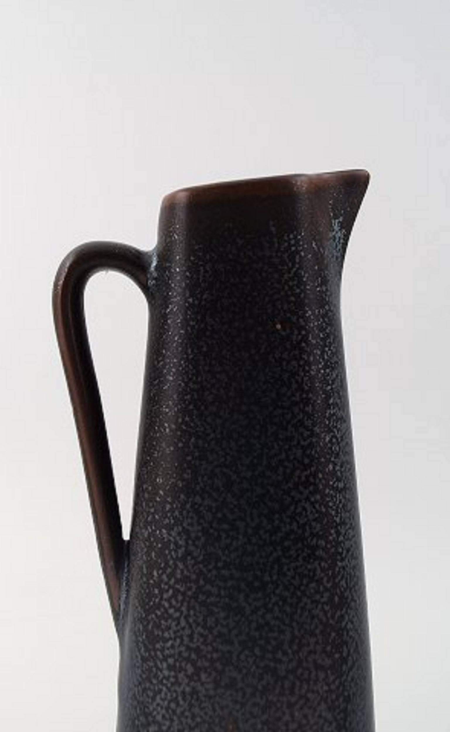 Gunnar Nylund, Rörstrand vase/pitcher in ceramics.
Beautiful glaze.
In perfect condition.
Measures: 26 cm height. Marked.