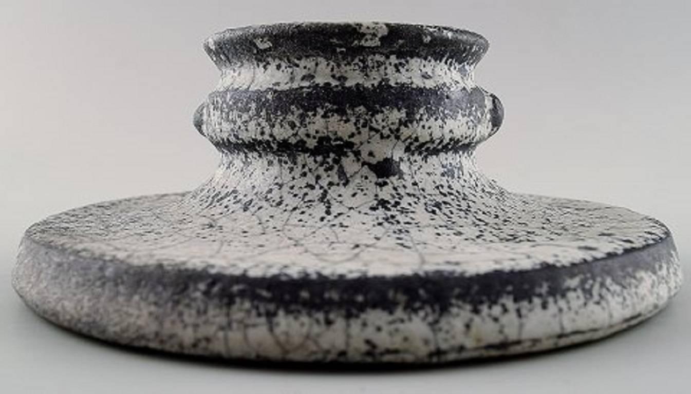 Svend Hammershøi for Kähler, Denmark, glazed candlestick, 1930s.

Designed by Svend Hammershøi. Glaze in black and gray.

Measures: 13 x 5 cm.

Marked.

In perfect condition.