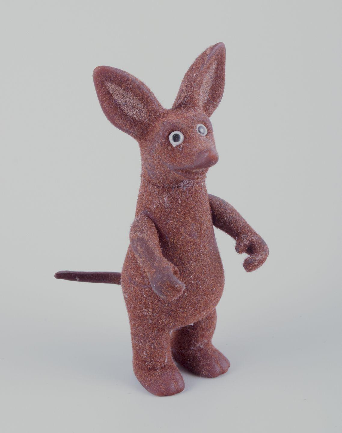 Pre-owned goods are exempt from import duties for U.S. customers. 
Therefore, no import tariffs will be applicable to your purchase.

Martinex, Finland. 
Moomin. Figurine of Sniff made of plastic covered with brown velour.
Late 1900s.
In excellent