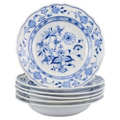Meissen, Germany. Set of six deep porcelain plates with "Blue Onion" pattern.