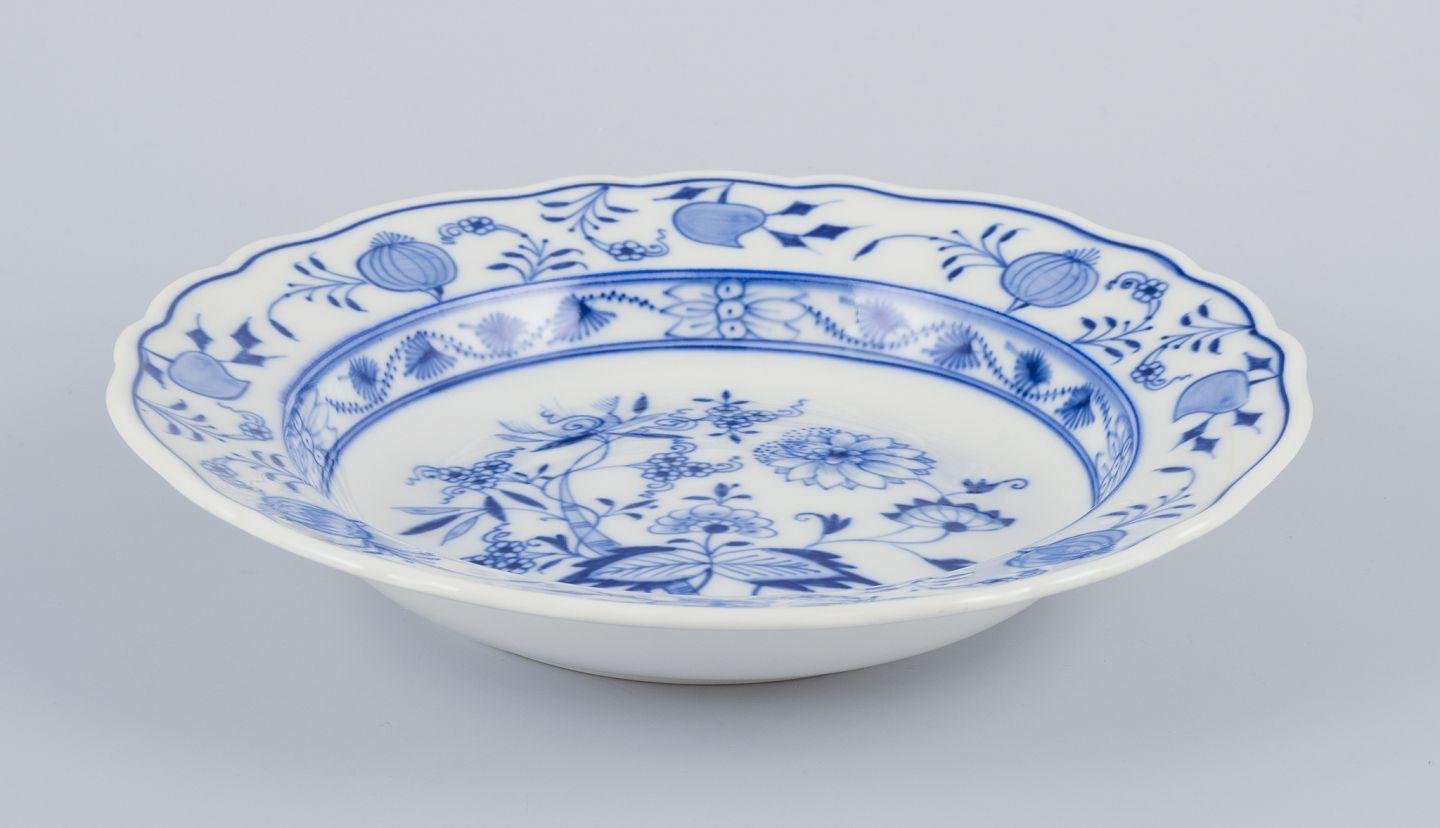 Pre-owned goods are exempt from import duties for U.S. customers. 
Therefore, no import tariffs will be applicable to your purchase.

Meissen, Germany.
A set of six deep porcelain plates with 