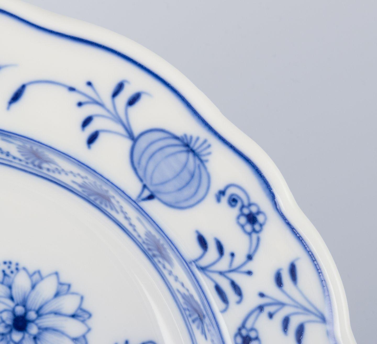 20th Century Meissen, Germany. Set of six deep porcelain plates with 