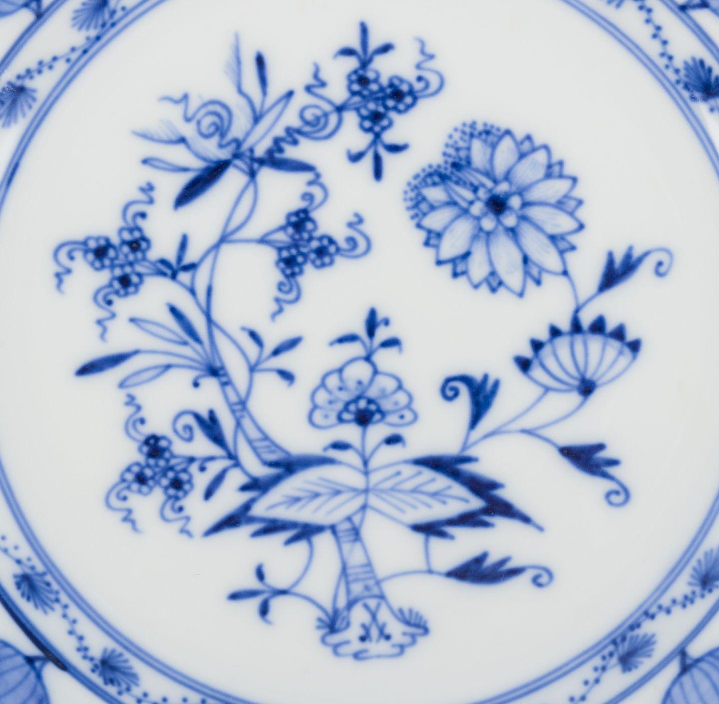 Glazed Meissen, Germany. Set of five porcelain plates with Blue Onion pattern. For Sale