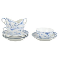 Royal Copenhagen. Set of 4 teacups with saucers. Blue Fluted Half Lace pattern.