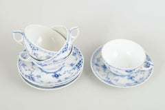 Royal Copenhagen. Set of 4 teacups with saucers. Blue Fluted Half Lace pattern.