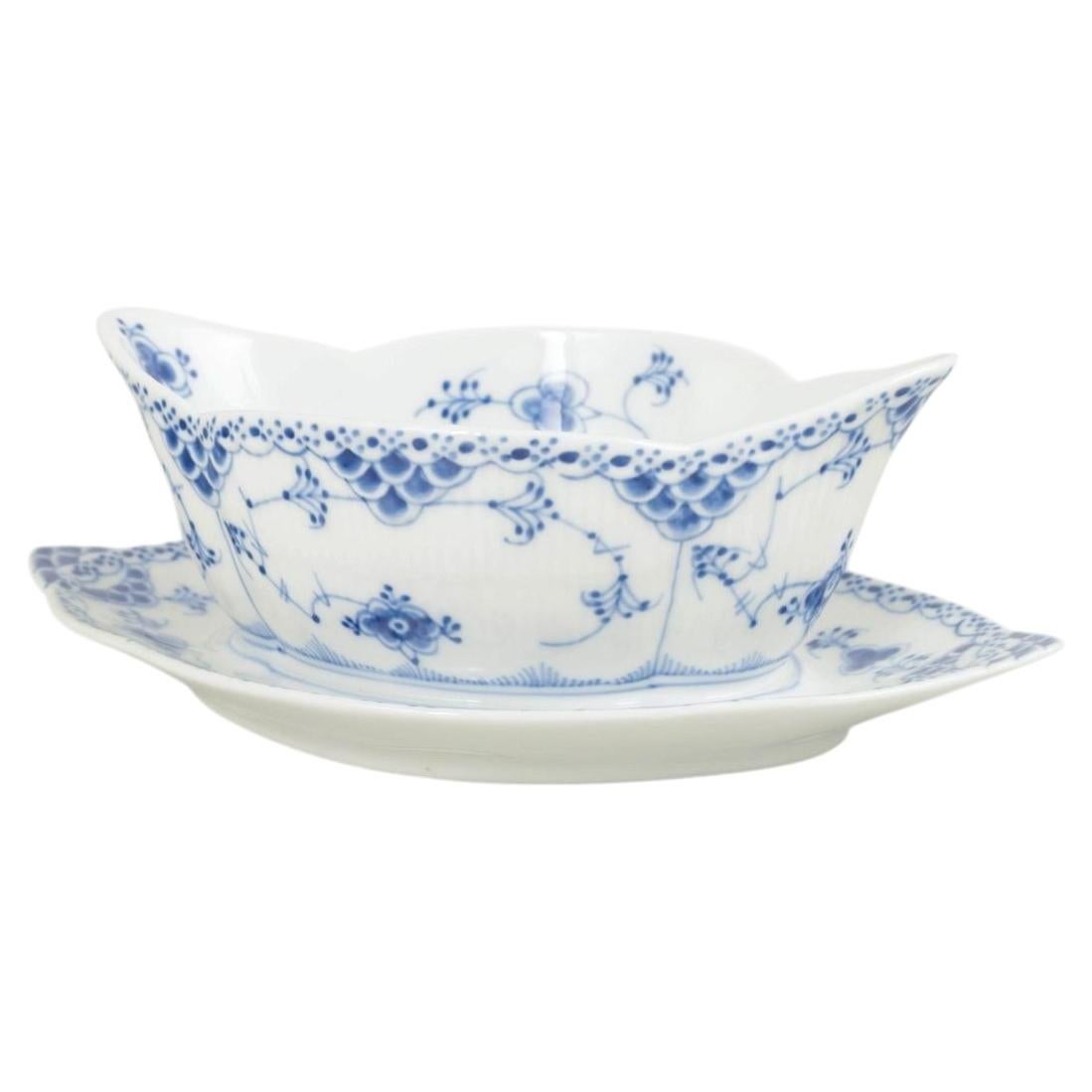 Royal Copenhagen. Blue Fluted Half Lace sauceboat in porcelain.