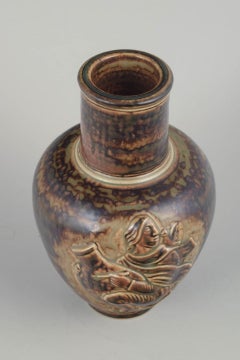 Jais Nielsen, Royal Copenhagen. Vase with Sung glaze and figurative relief scene