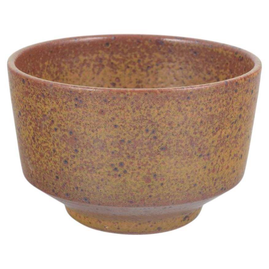 Marianne Starck for Michael Andersen. Stoneware bowl in warm brown-yellow tones.