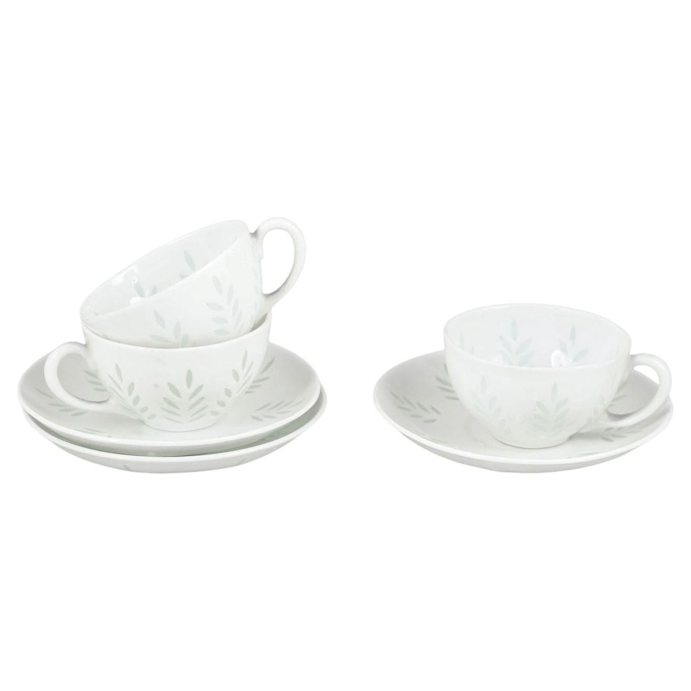 Friedl Holzer-Kjellberg, Arabia. 3 mocha cups & saucers. Rice grain porcelain.