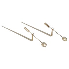 Pierre Forssell for Skultuna. A pair of wall-mounted candle holders in brass.
