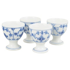 Royal Copenhagen. Set of four egg cups, Blue Fluted Plain. 1920s.