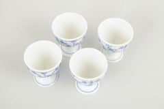 Royal Copenhagen. Set of four egg cups, Blue Fluted Plain. 1920s.